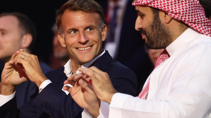 French President Emmanuel Macron (L) and the Crown Prince and Prime Minister of Saudi Arabia Mohammed bin Salman attend the closing ceremony of the Esports World Cup at the Grand Palais in Paris, France, on August 23, 2026.