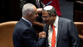A file photo showing Israeli Prime Minister Benjamin Netanyahu and Itamar Ben-Gvir shaking hands in the Knesset in Jerusalem.