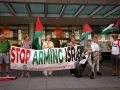 Anti-Israel protesters hold a banner and wave flags outside the Trades Union Congress ahead of Andy Burnham's arrival in London on July 17, 2026. Photo by Alishia Abodunde/Getty Images.