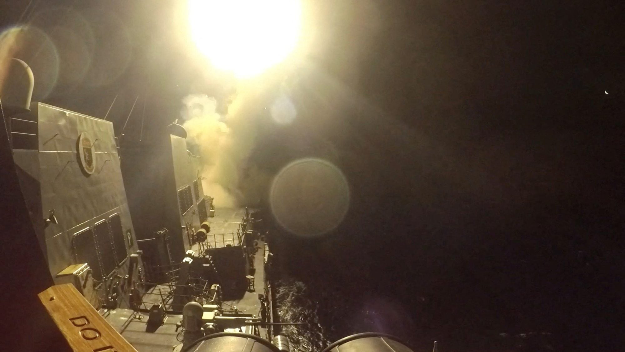 USS Michael Murphy (DDG 112) launches Tomahawk cruise missiles from an unknown location, as the United States launched new strikes against multiple targets overnight in Iran, the U.S. military said on Wednesday, in this still image obtained from a handout video