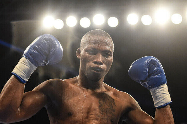 Two arrested over murder of boxing star