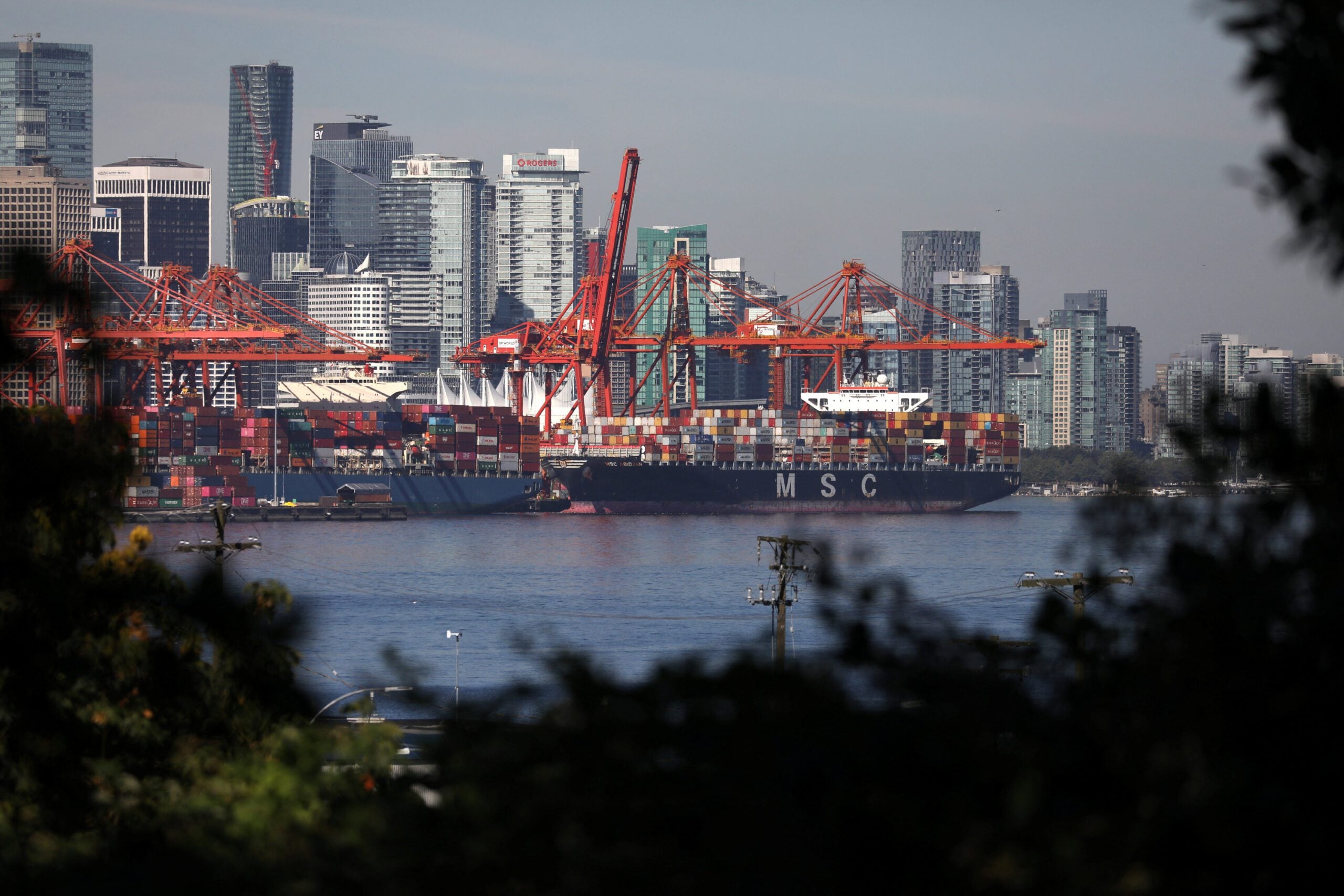 Container ships berth at the Port of Vancouver in Vancouver, British Columbia, Canada, July 20, 2023. REUTERS/Chris Helgren