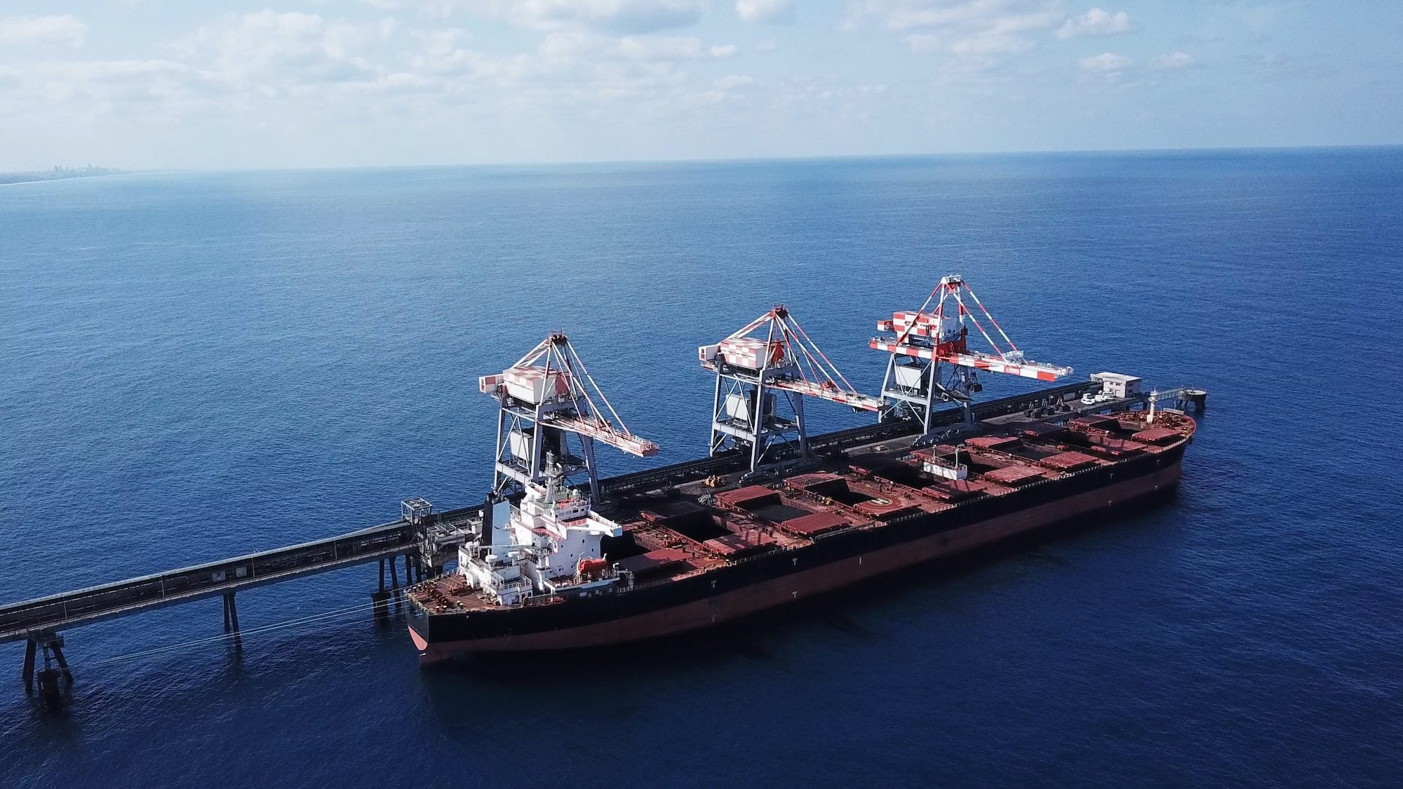 Dry bulk coal shipping. ImagineStock/Shutterstock