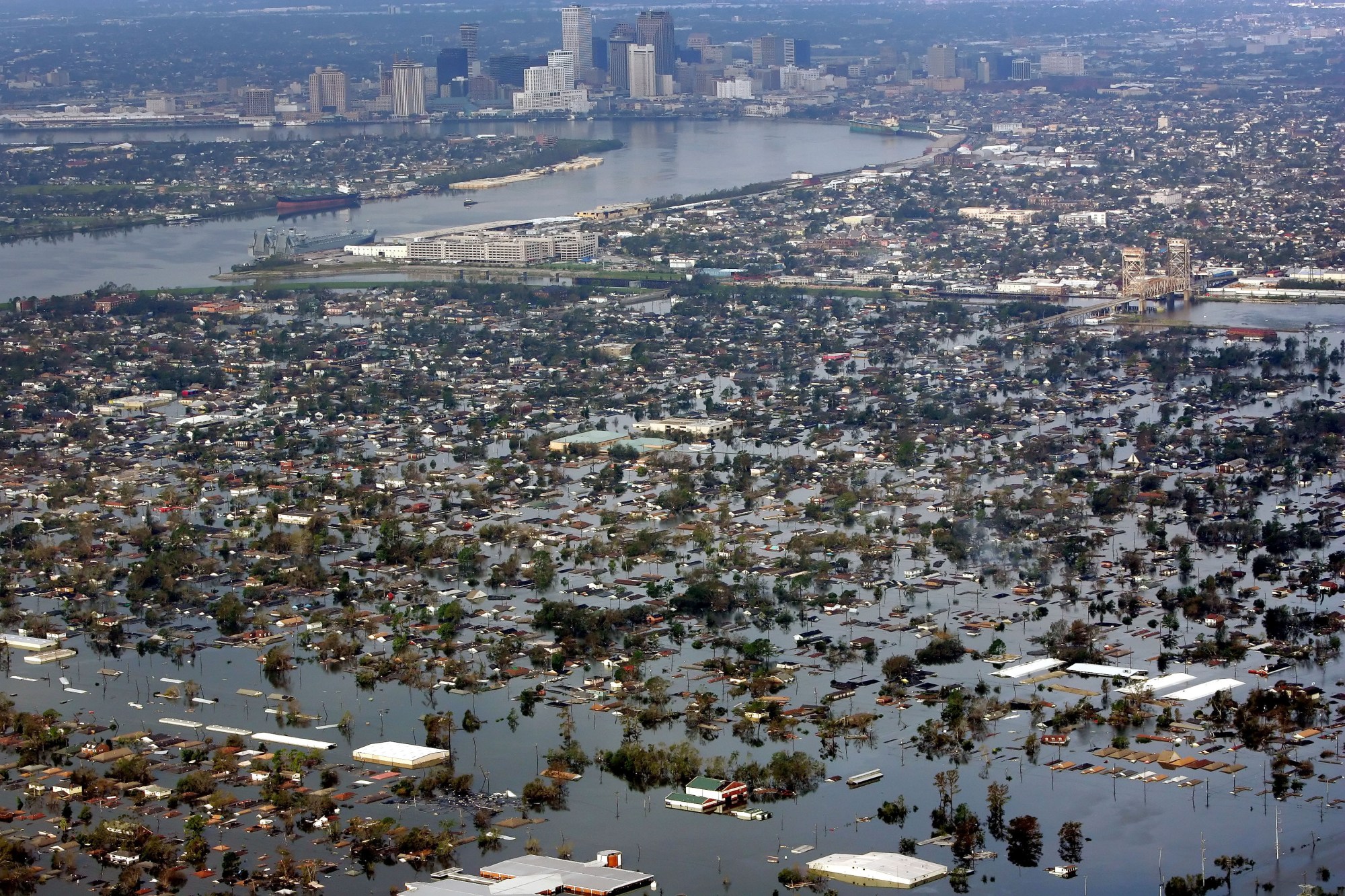 FILE – In this Aug. 30, 2005 file photo, floodwaters from Hurricane Katrina cover a portion of New Orleans. The most destructive storm in U.S. history and also one of the deadliest, Katrina was a Category 3 storm with estimated maximum winds of 125 mph when it made landfall near Buras, La., on Aug. 29, 2005. Broken levees left most of New Orleans inundated. Damage was estimated at $75 billion, though rebuilding costs have far exceeded the initial damage. Katrina was blamed for around 1,200 deaths. (AP Photo/David J. Phillip, File)
