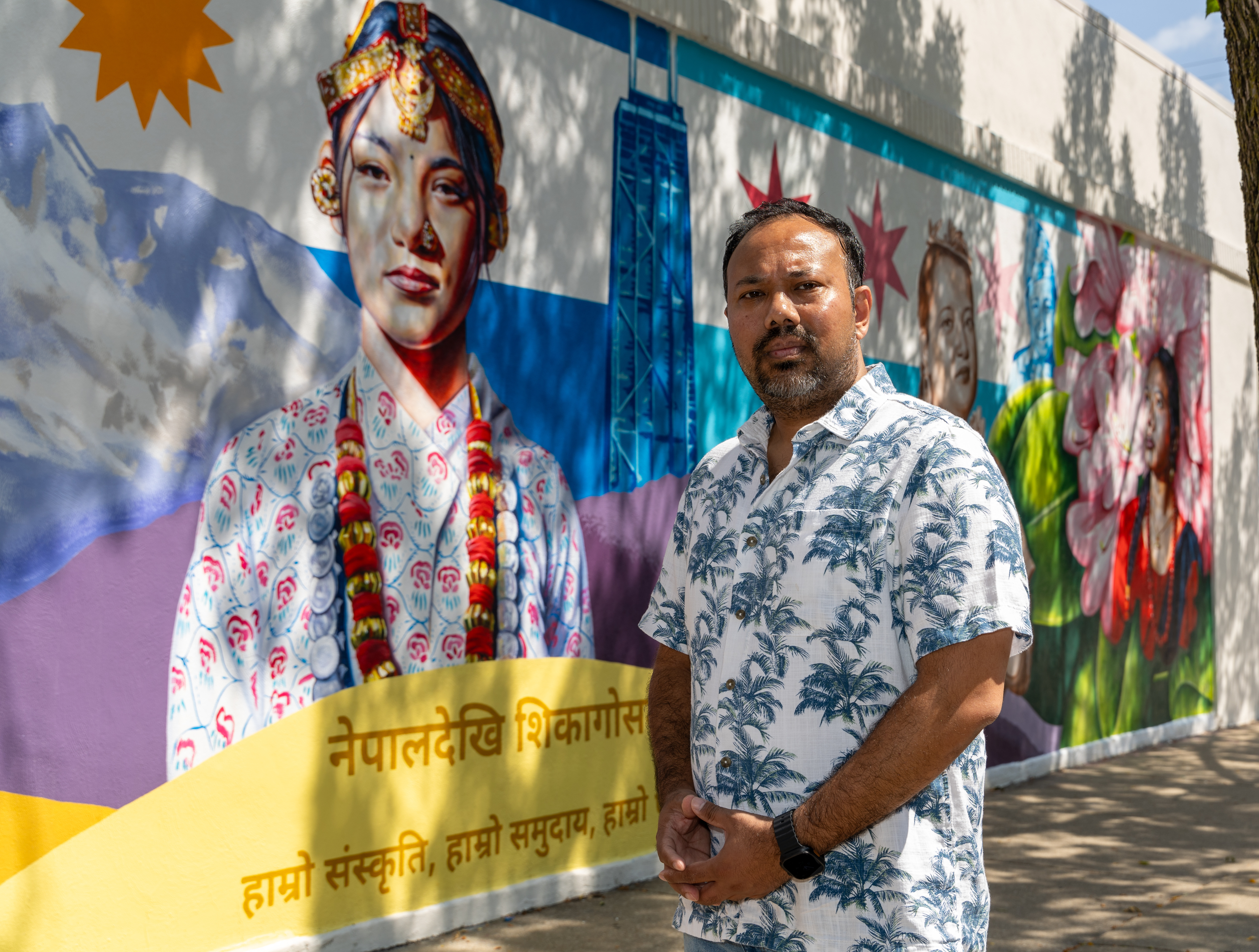 CTC-L-NEPAL-FLOOD.jpg Rajan Shahi stands in front of a new Edgewater mural commemorating the Nepalese American people living in Chicago, on Aug. 28, 2026. The mural reads, in part, “From Nepal to Chicago.” (Arthur Maiorella/Chicago Tribune)