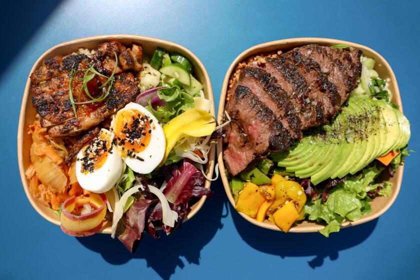 LOS ANGELES - AUGUST 4, 2026: The green bowl and kimchi bowl at Fountain Grains & Greens on August 4, 2026.