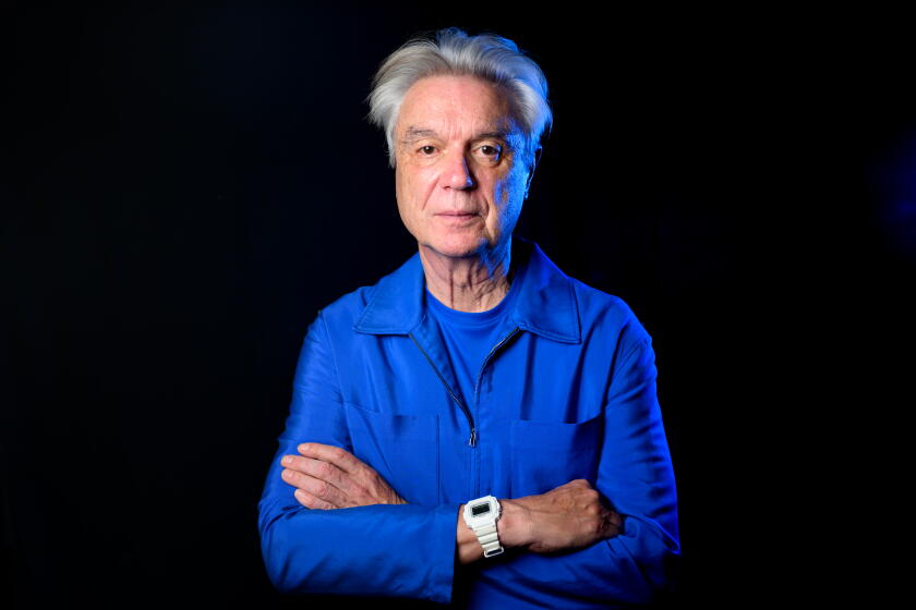 BERKELEY, CA - AUGUST 25, 2026: Musician David Byrne, the former front man for the Talking Heads, stands for a portrait backstage at the Greek Theatre ahead of his concert in Berkeley, CA on August 25, 2026. (Josh Edelson / For the Times)