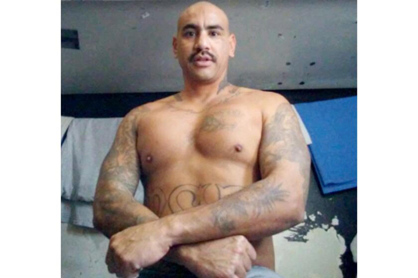 Ezequiel Romo, photographed in his cell at Centinela State Prison, continued to run Blythe Street from behind bars.