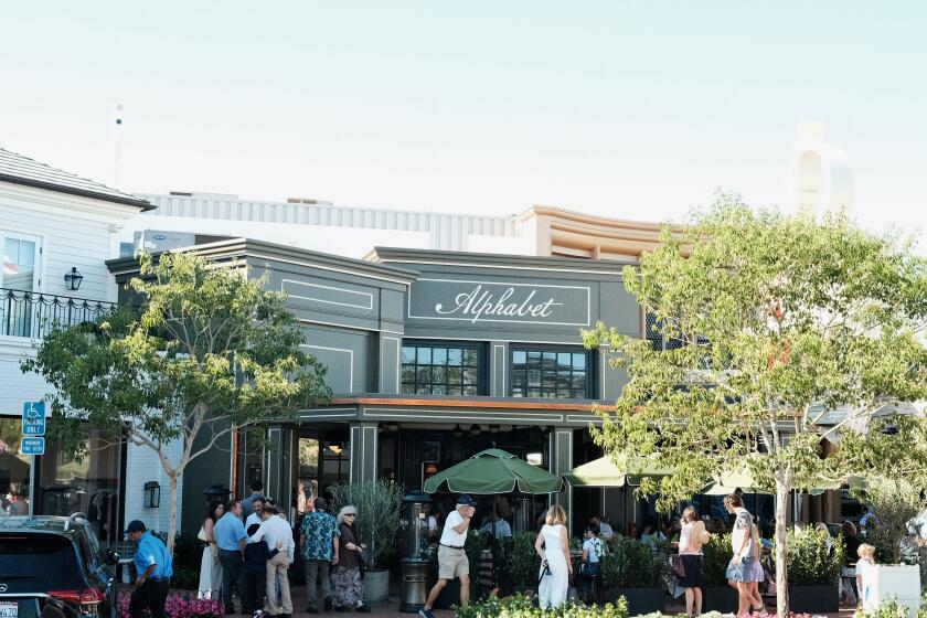LOS ANGELES -- AUGUST 9, 2026: Alphabet Bar & Grill, a new restaurant from chef Timothy Hollingsworth and h.wood Group, is located inside the Palisades Village shopping center in Pacific Palisades, California, pictured on Sunday, Aug. 16, 2026. (Stephanie Breijo / Los Angeles Times)