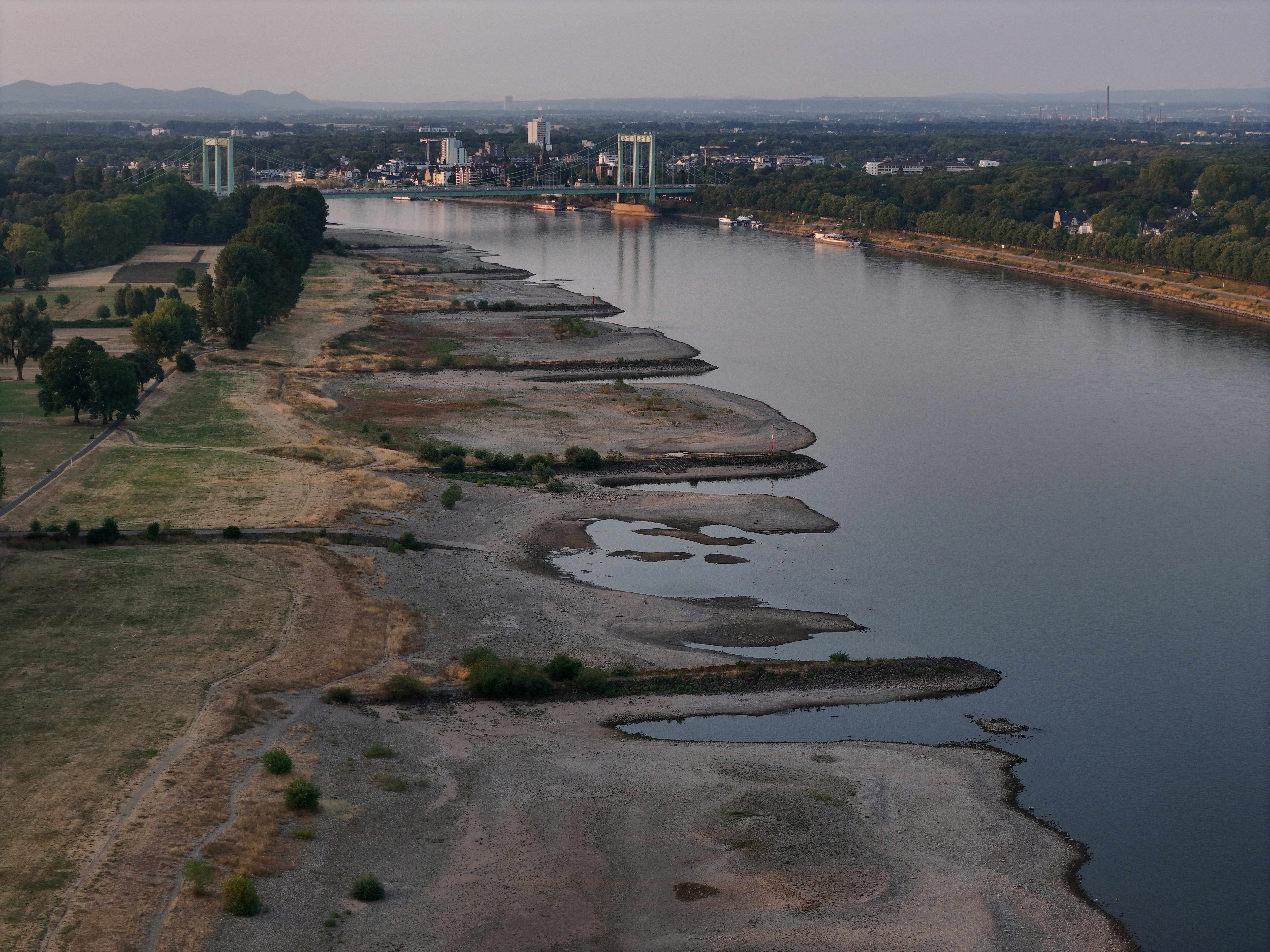 A drone picture shows the banks of the river Rhine during a period of low water level in Cologne, Germany
