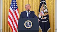 Trump threatens TV broadcast licenses after networks skip speech