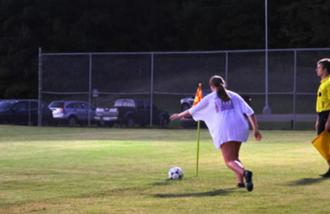 Person about to kick a corner kick in soccer