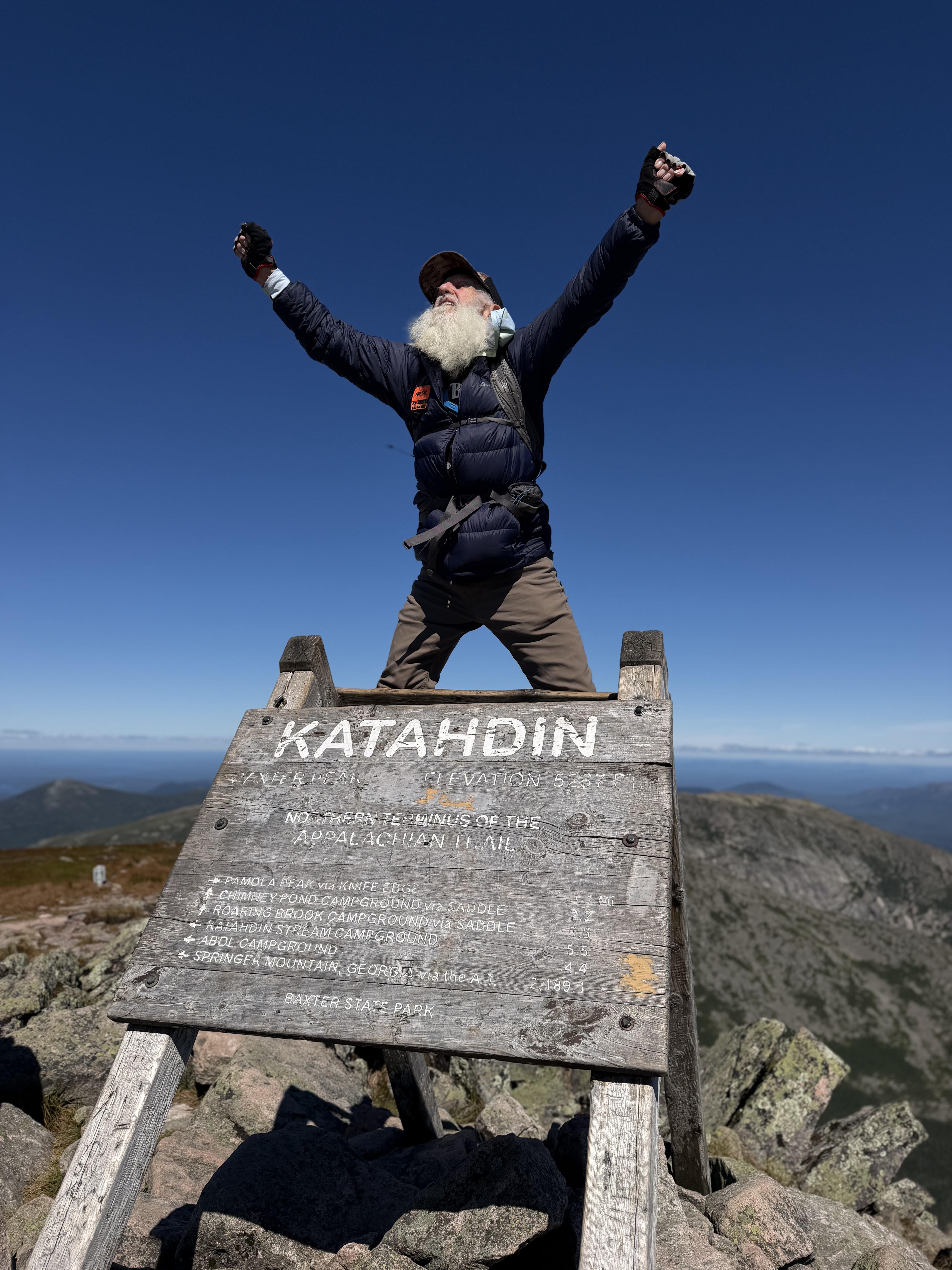 Sanders celebrates after completing his hike