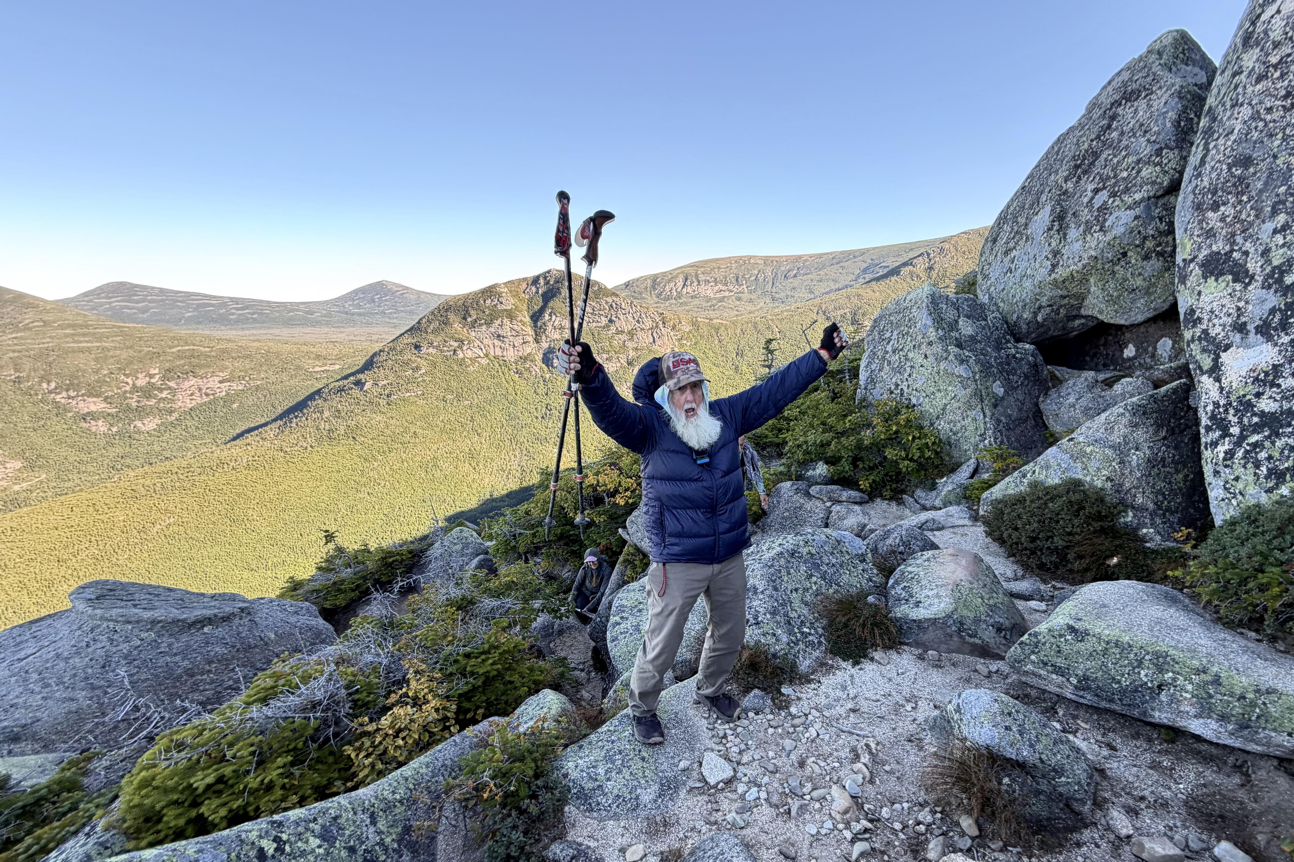 Dale Sanders, 91, celebrates after completing a difficult section of Mt. Katahdin, Monday, Aug. 31, 2026, in Baxter State Park in Piscataquis County, Maine