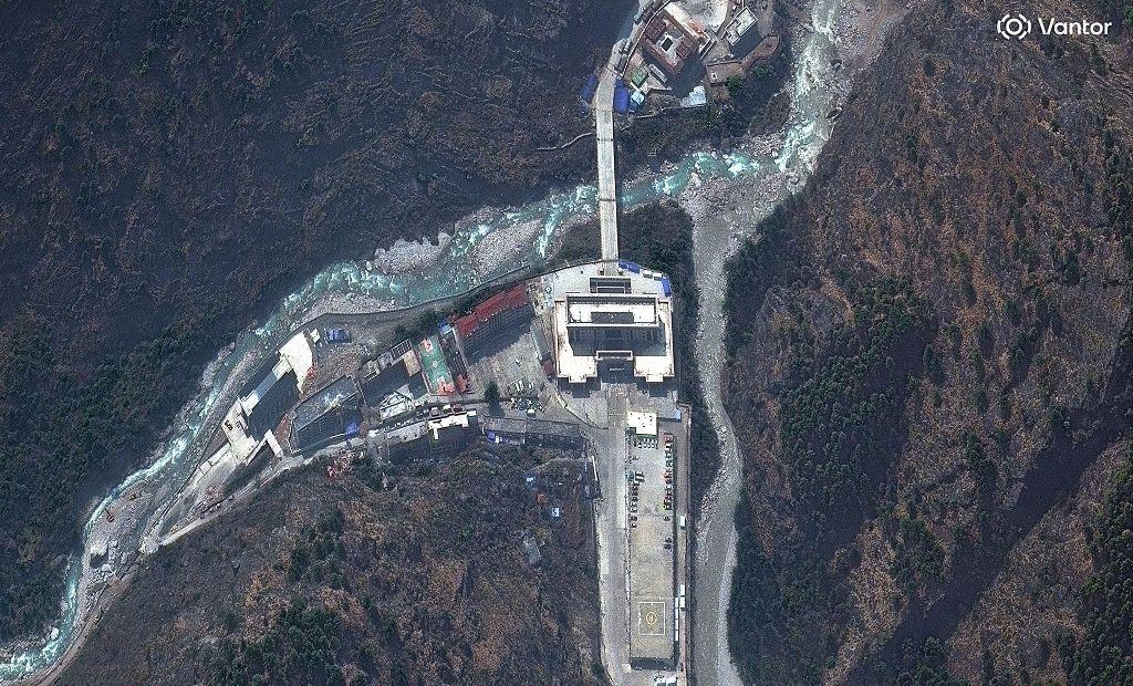 Vantor satellite image shows the area near the Nepal-China border and Rasuwagadhi border post before the devastating floods swept away multiple buildings and vehicles. 