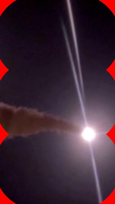 A missile against the dark sky