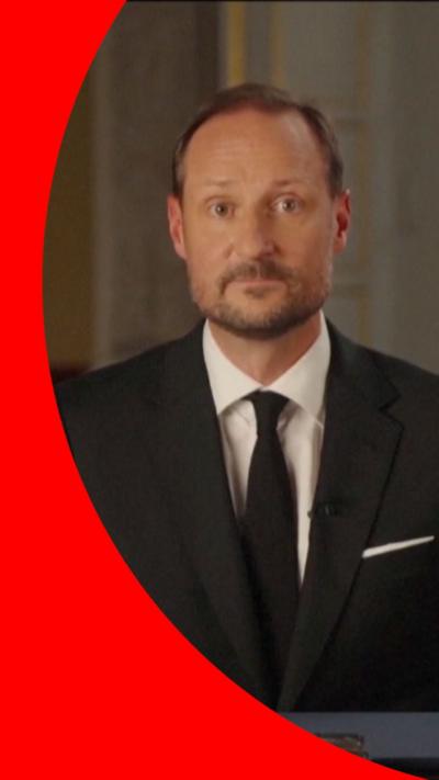Norway's King Haakon VIII at desk