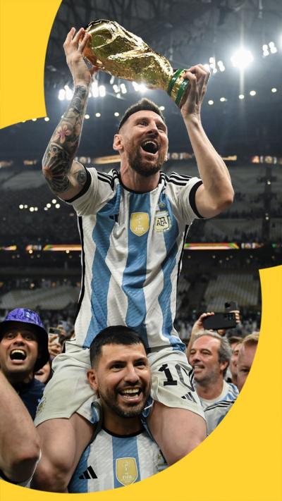 Lionel Messi holding the World Cup