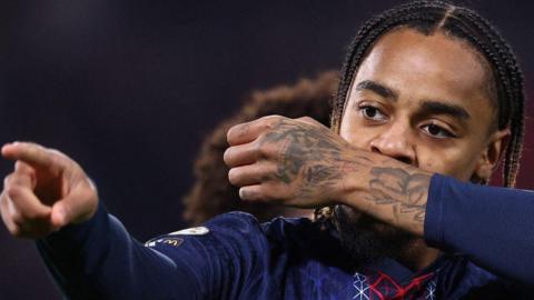 Paris Saint-Germain's Bradley Barcola celebrates after scoring his side's first goal during the Ligue 1 match against Strasbourg on October 17, 2025