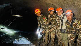 Handout photograph taken and released by Nepal's Prime Minister Secretariat on August 31, 2026. It shows Nepali soldiers inspecting a tunnel to rescue workers at Rasuwagadhi Hydropower Project.