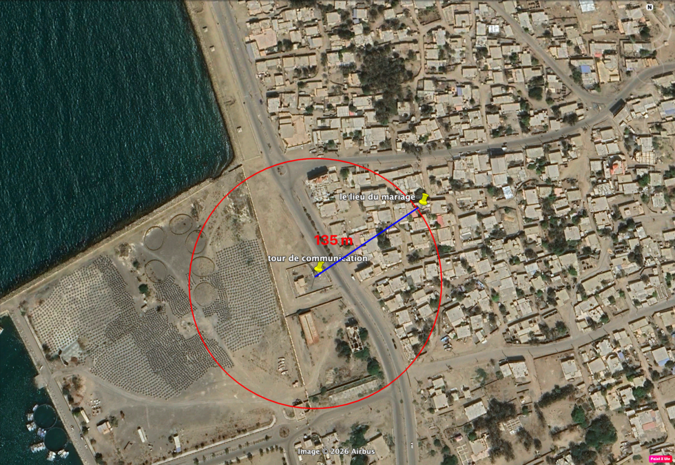 The distance between the communications tower in Kuhestak and the building where a wedding was being held is more than 135 meters.