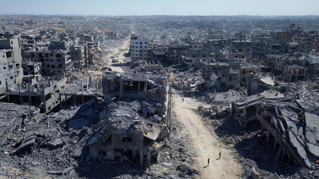 In this drone photo, buildings destroyed during two years of Israeli army bombardments are seen in Gaza City, October 15, 2025.