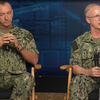 A screenshot of Perryman and Caudle at the town hall.