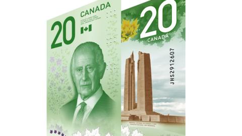 An image showing the vertical Canadian banknote showing its front and back. The banknote is green. On the front there is a portrait of King Charles, with floral and leafy motifs around him. Above him is a small Canadian flag, the words CANADA and the number 20 to his left. 
The back of the note shows the Vimy Ridge monument in France. Above the monument are green maple leafs, the word CANADA and the number 20, both written in white.