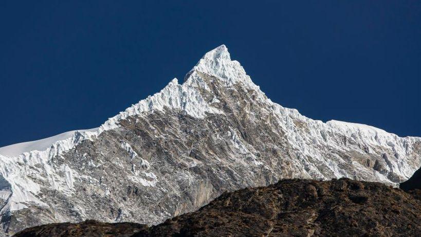 Scientists say a collapsed glacier near the Langtang Lirung peak likely caused the disaster