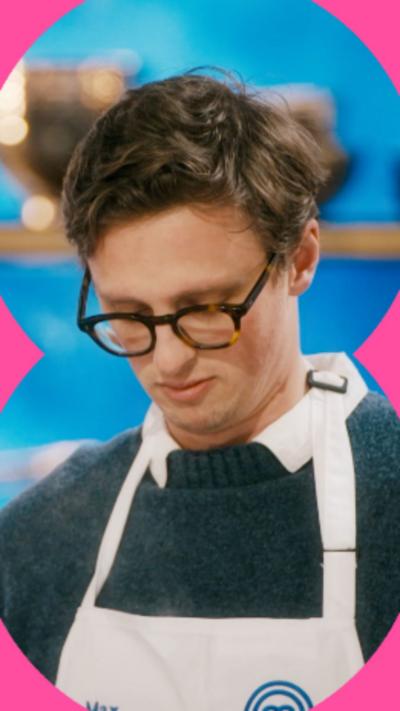 A man, Max Fosh, bows his head in disappointment. He has short brown har and glasses.