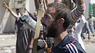 Mass prison escape as armed clashes rock western Libya