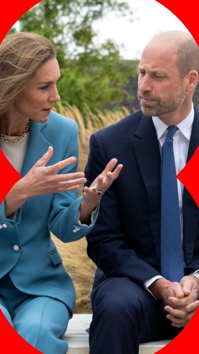 The Prince and Princess of Wales sitting next to each other outside