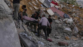 People carry the body of a person who was killed by an Israeli air strike on a house in Arab Salim village, southern Lebanon, on September 6, 2026