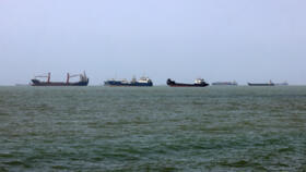 Vessels transit the Strait of Hormuz off Bandar Abbas in southern Iran on August 10, 2026