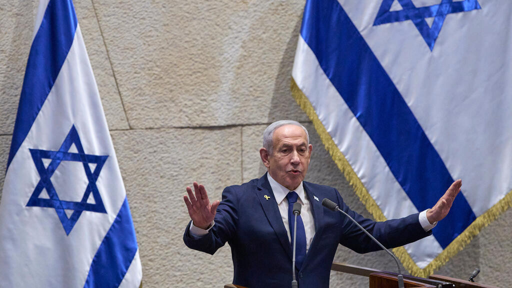 Israel's Prime Minister Benjamin Netanyahu addresses lawmakers in the Knesset, Israel's parliament, in Jerusalem, Monday, Nov. 10 2025