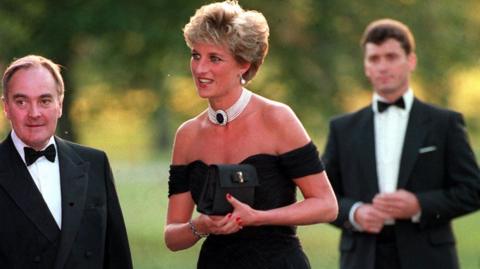 British royal Diana, Princess of Wales (1961-1997) wearing a black Christina Stambolian dress, attends a Vanity Fair party at the Serpentine Gallery in London, England, 20th November 1994.