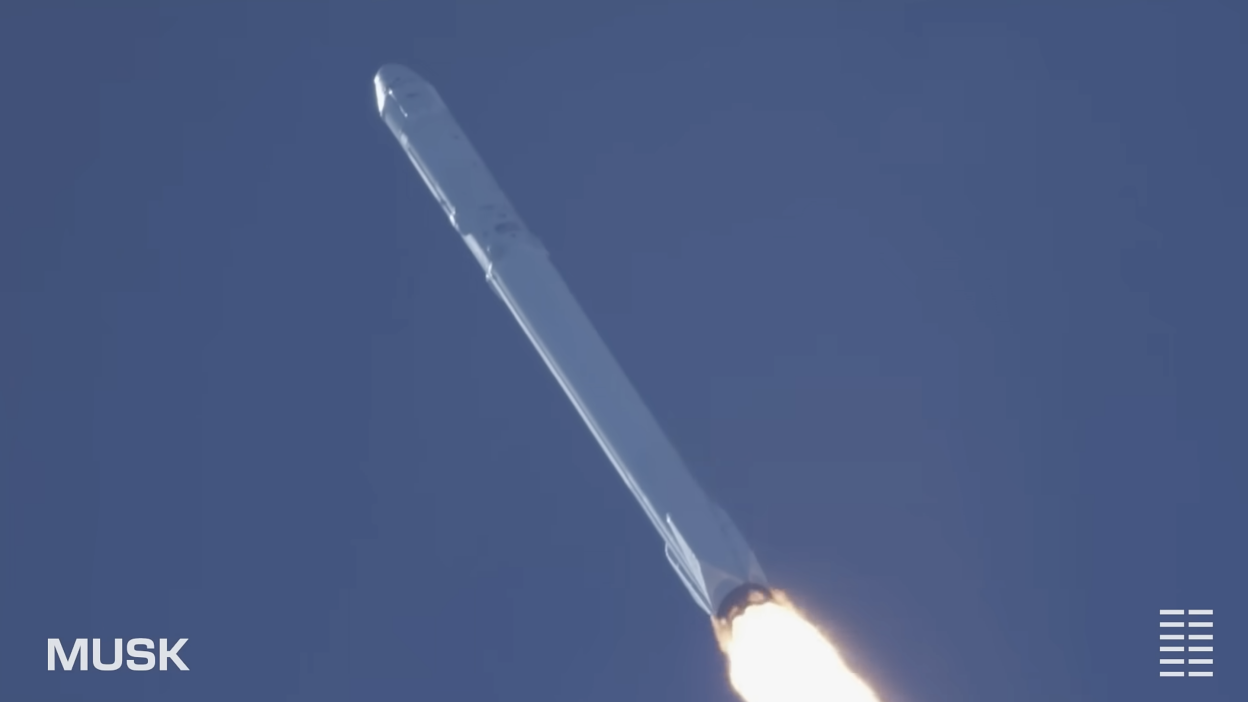 A rocket flies through the sky.