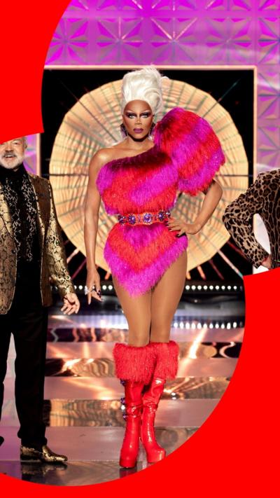 Grasham Norton, RuPaul Charles and Alan Carr on the UK drag race runway.