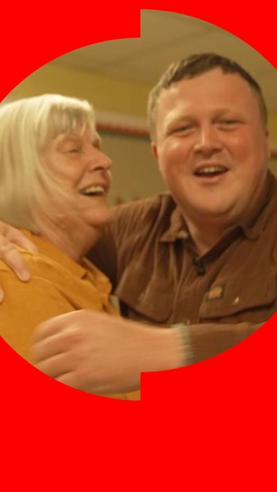 A man hugging a woman