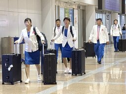 N. Korean athletes arrive in Beijing en route to Asian Games in Japan