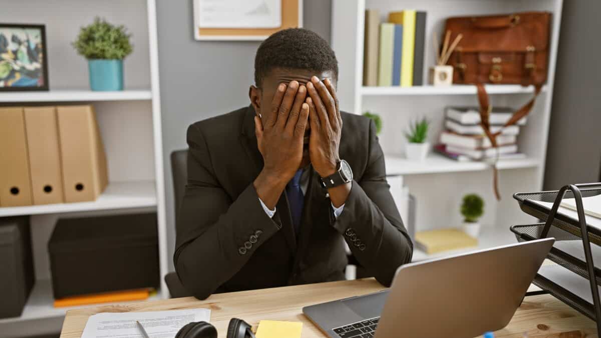 Stressed out man at his work desk