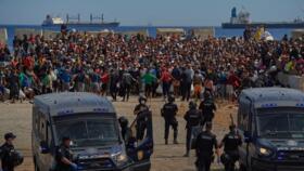 File photo of migrants from Morocco in the Spanish exclave of Ceuta taken August 21, 2026