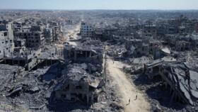 In this drone photo, buildings destroyed during two years of Israeli army bombardments are seen in Gaza City, October 15, 2025.