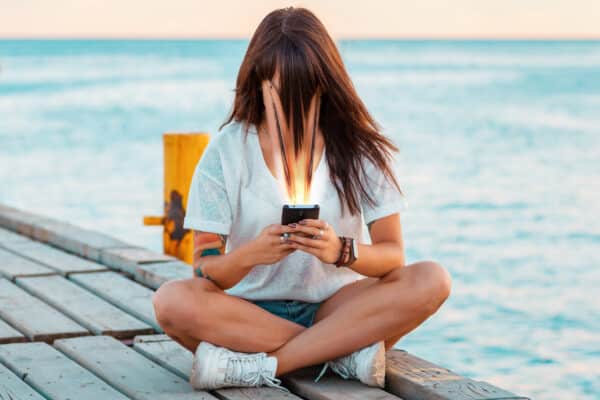 Woman glued to her smartphone