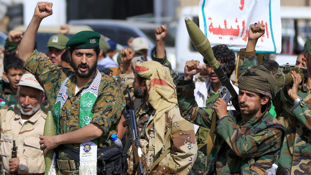 Houthi fighters shout slogans during a rally in Sanaa on September 10, 2026.