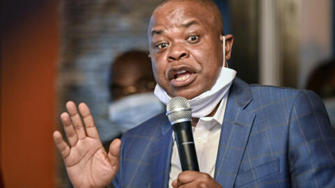 L'ancien ministre ivoirien du Budget, Justin Katinan Koné, lors d'une cérémonie d'accueil à son arrivée à Abidjan, le 30 avril 2021.