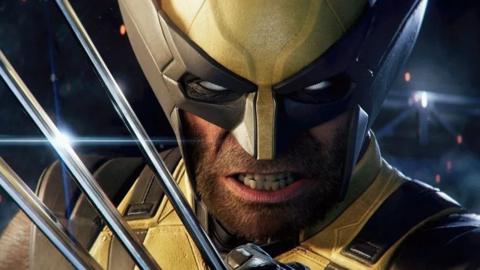 A close-up of the game character Wolverine. He is a man wearing a yellow-and-black superhero costume. He has long metal claws coming out of his hand. He is gurning at the camera. 