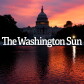 Sun begins to rise behind the U.S. Capitol dome