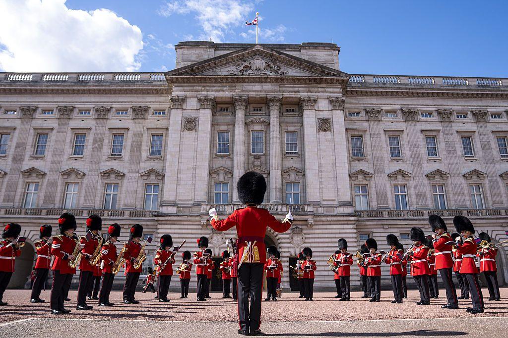 Members from the Massed Bands of the Guards Division play on the forecourt of Buckingham Palace in London, during a commemorative Changing the Guard, in honour of the 25th anniversary of 9/11 terror attacks