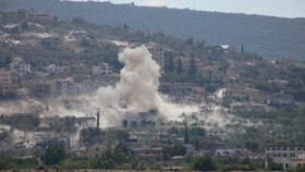 This photo, taken from the village of Al-Haniyya in southern Lebanon, shows smoke rising from a controlled explosion carried out by Israeli forces at neighboring village, Al-Mansouri, on September 4.